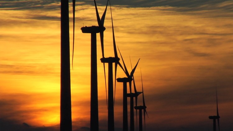 wind turbines in the sunset